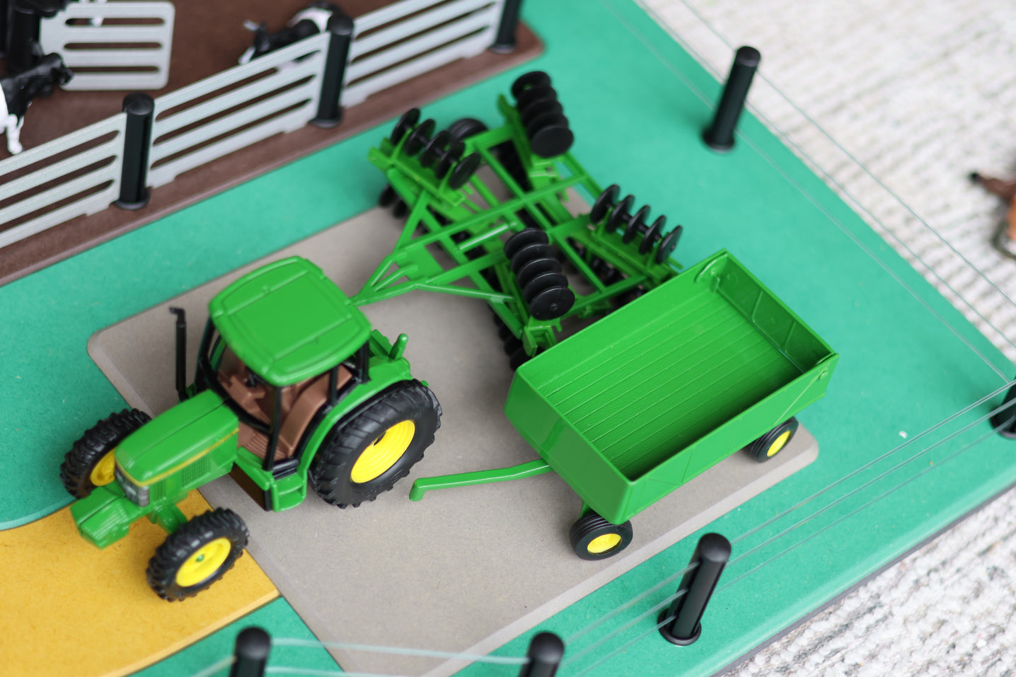 John Deere Tractor with Barge Wagon & Disk Plow.